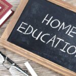 career development and education. Home education written on a small blackboard.